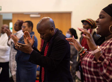 Congregation Members in Praise Worship